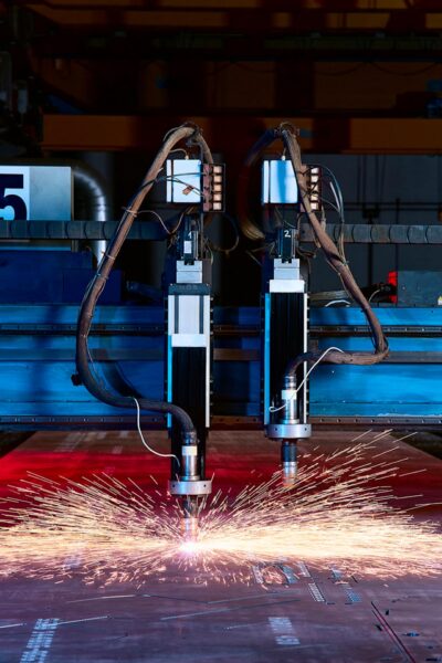 Fotografia corporate aziendale, realizzata da OG Studio fotografico di Vicenza, fotografia di industrie, macchine, presse, lavorazioni meccaniche, lavorazioni artigianali, fotografia realizzata per l'azienda Zoppelletto di Cavazzale a Vicenza
